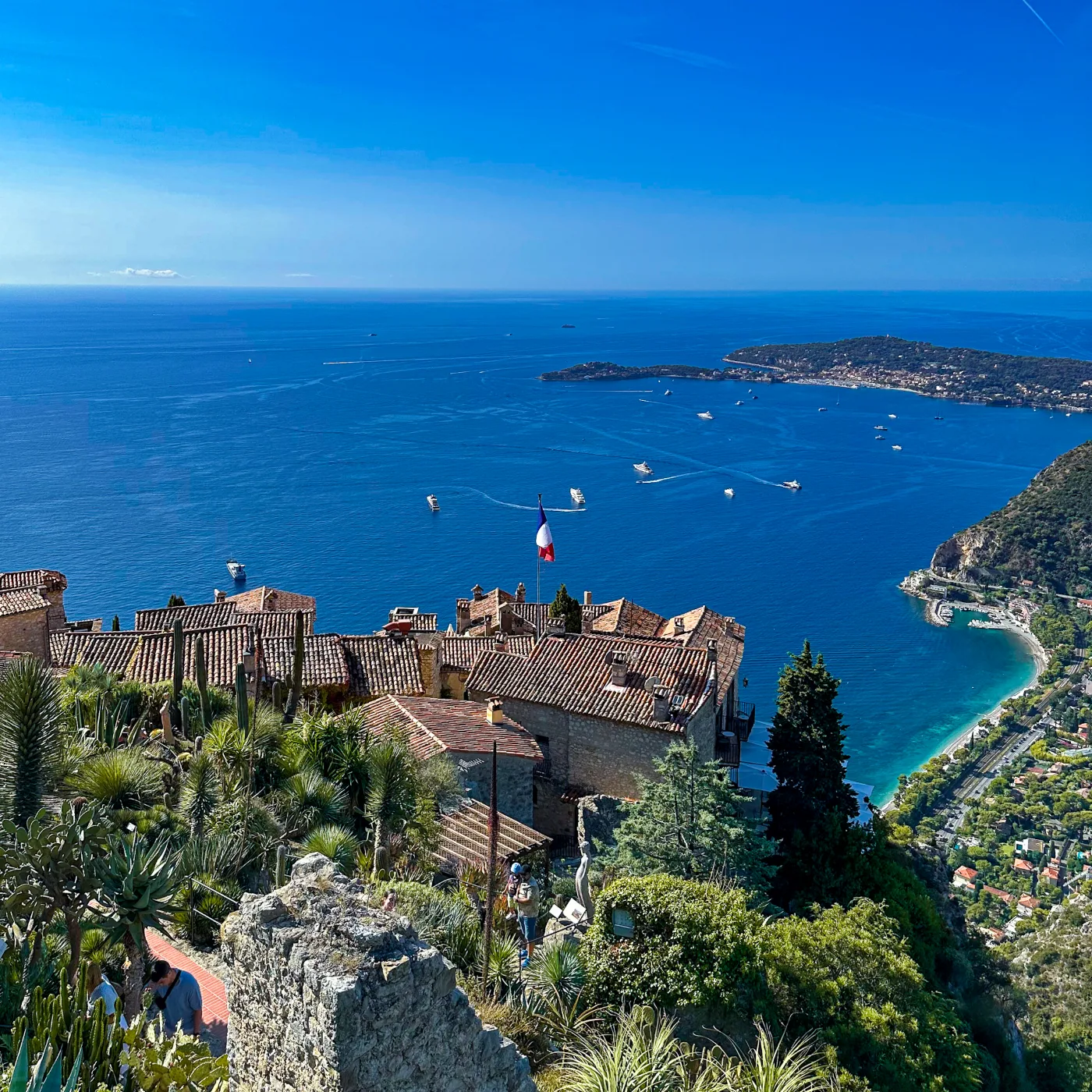 Hilltop village rooftops above the Mediterranean