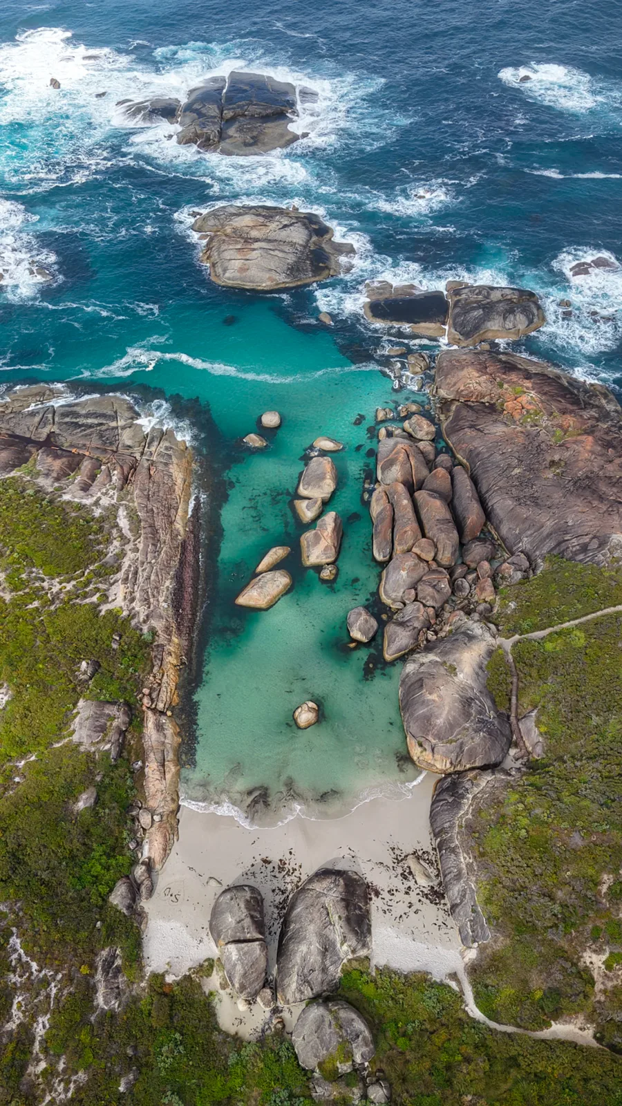 Aerial view of a turquoise coastal cove